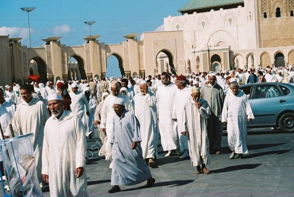 Morrocans coming from the Mosque, Casablanca, Morroco